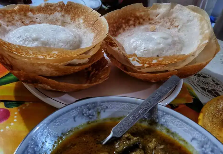 Hoppers with a fish curry