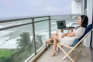 Digital nomads - working remotely from an ocean-view balcony in Sri Lanka