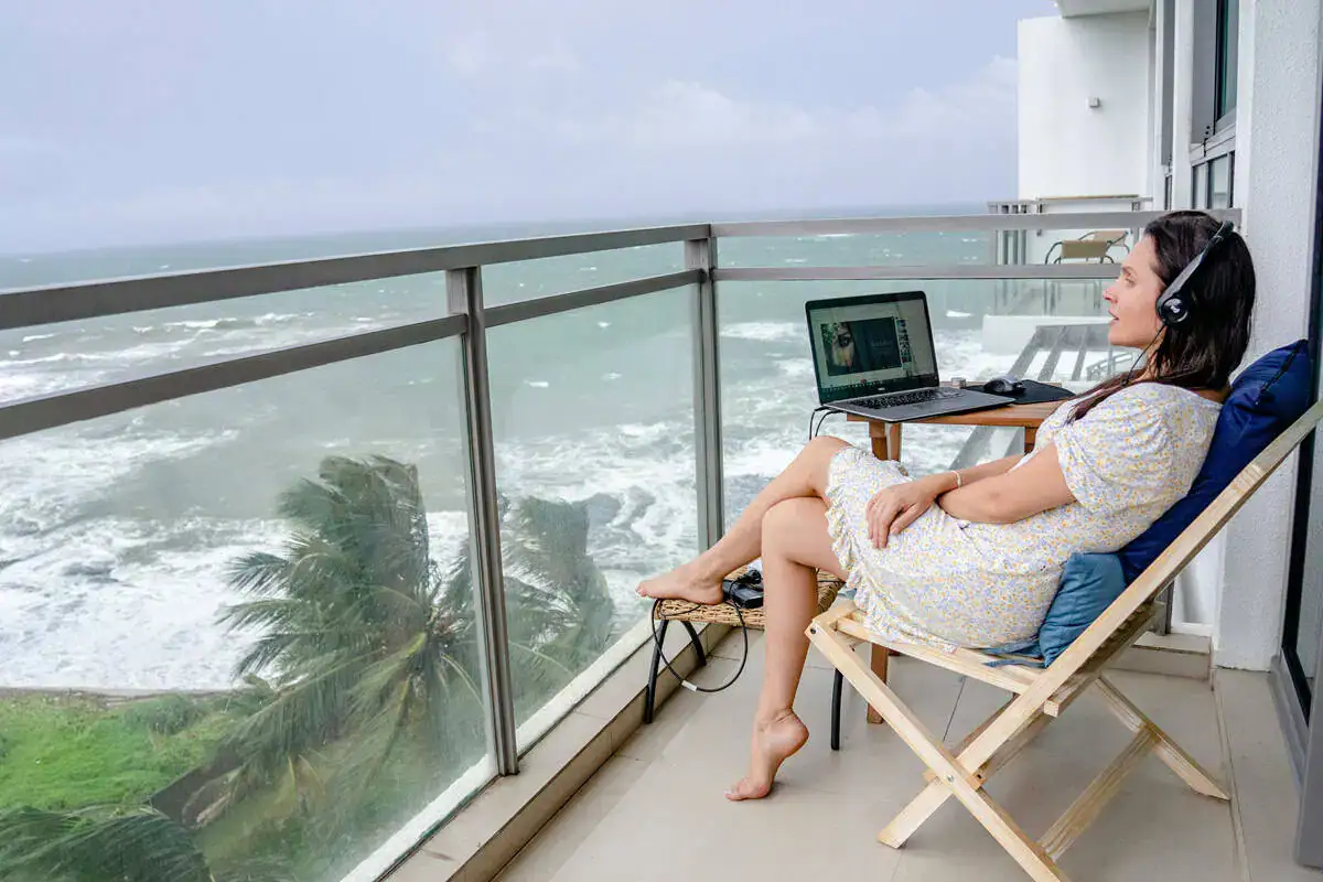 Digital nomads - working remotely from an ocean-view balcony in Sri Lanka
