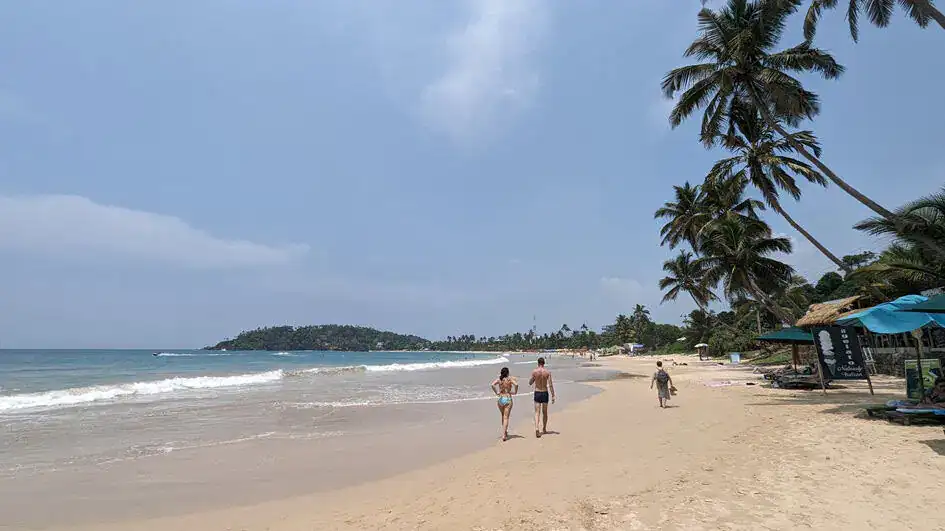 A sunny day and calm water - Mirissa Beach
