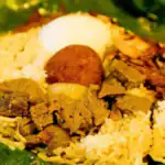 A delicious Sri Lankan meal wrapped in a banana leaf