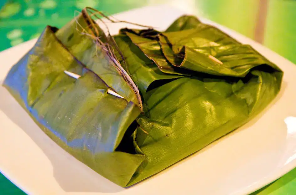 Ready to open the banana wrap to enjoy the meal