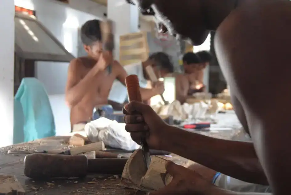 Working hard to make a mask