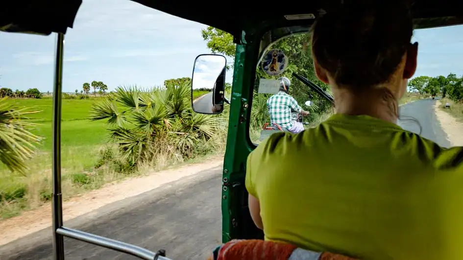 A self-drive tuk-tuk safari along a village road