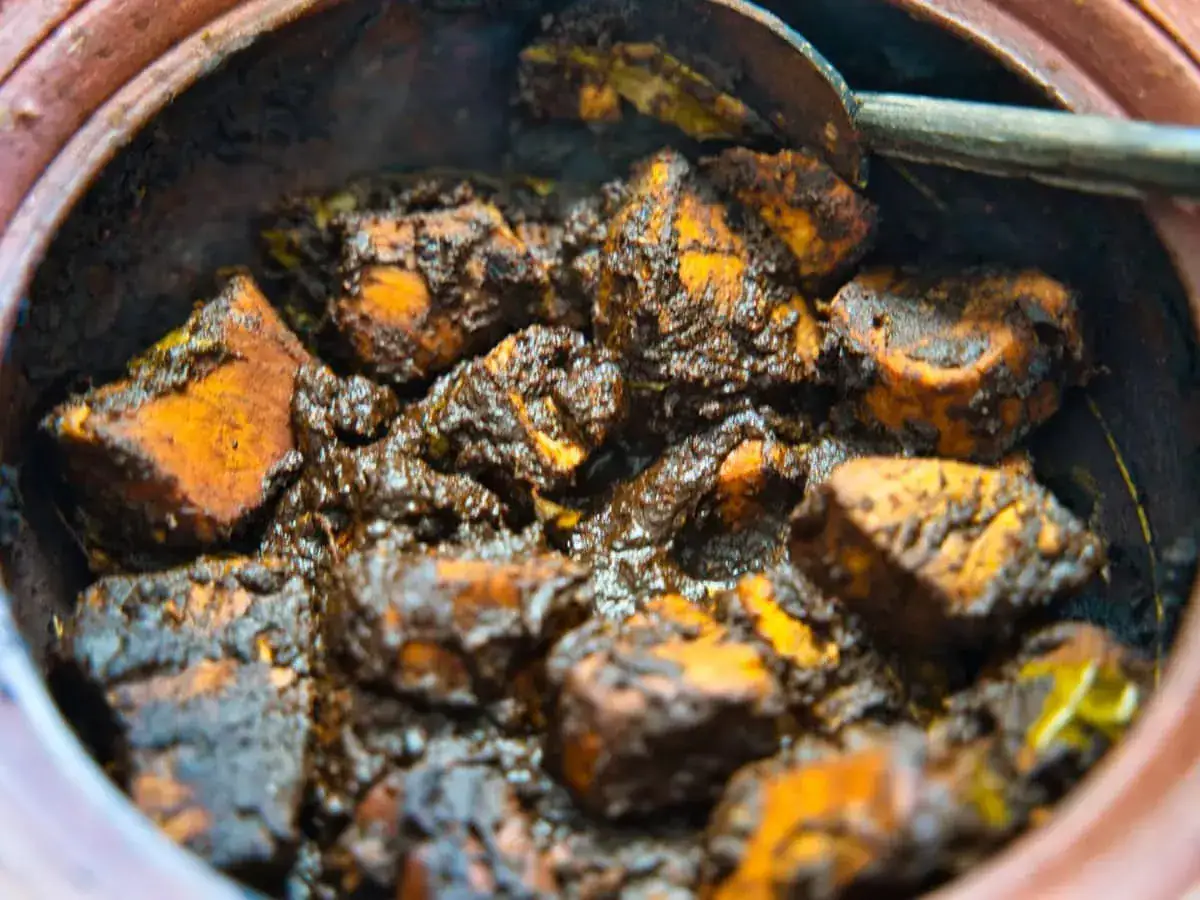 Traditional Sri Lankan Fish Ambul Thiyal with a dark dry spice coating