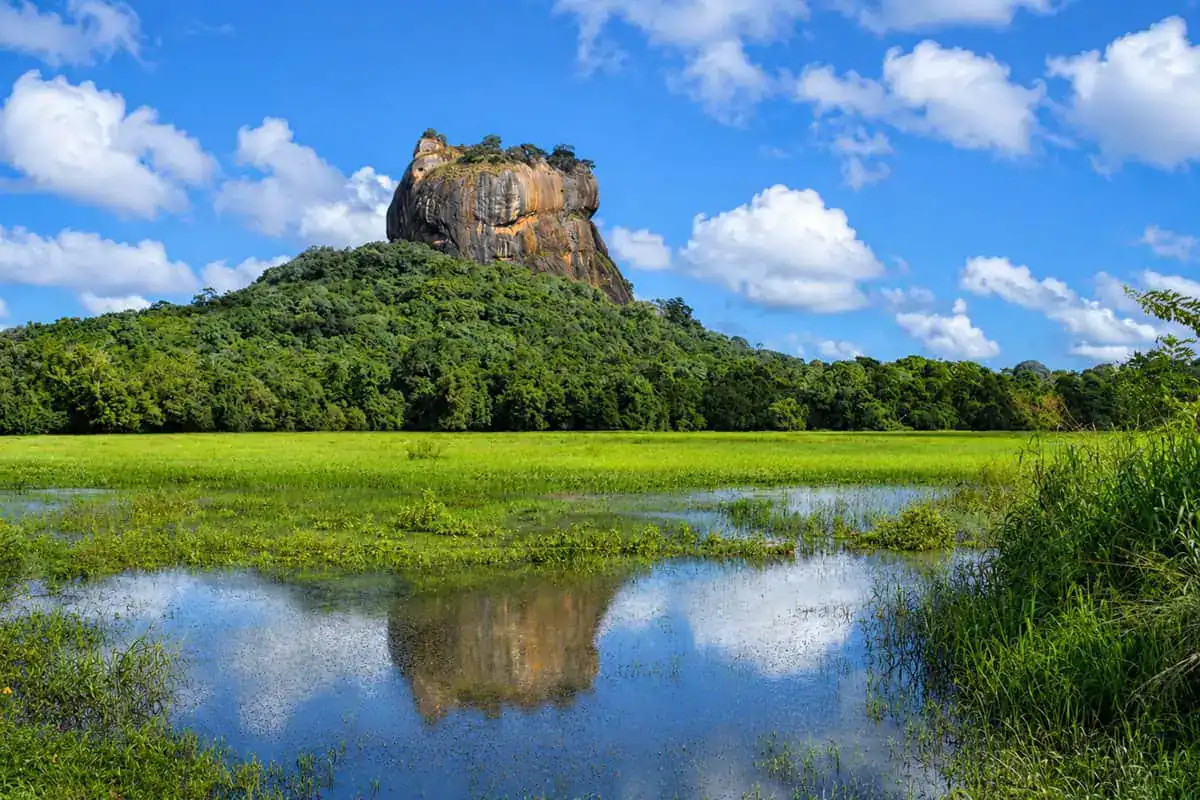 Sigiriya reflected in water in Sri Lanka