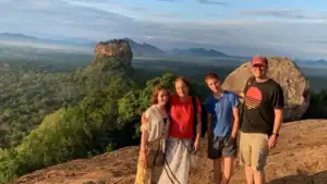 Family at Pidurangala overlooking Sigiriya, one of the best family destinations in Sri Lanka